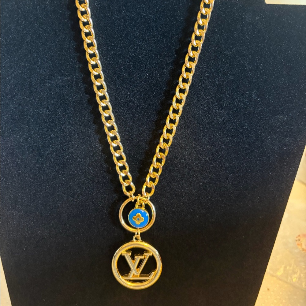 Luxurious Gold Necklace with Blue Pendant